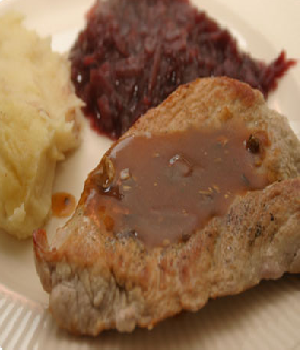 Gepaneerde schnitzel met kruidenbitter jus